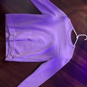 Medium Purple “far from over” crew neck.